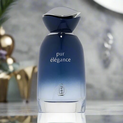 Pur Elegance Perfume bottle, 100ml EDP, showcasing a vibrant blend of citrus and floral notes.