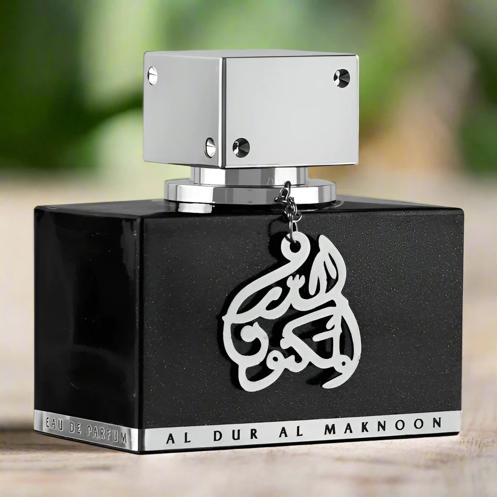 Lattafa Al Dur Al Maknoon Silver 100ml Eau de Parfum bottle with a sleek design.