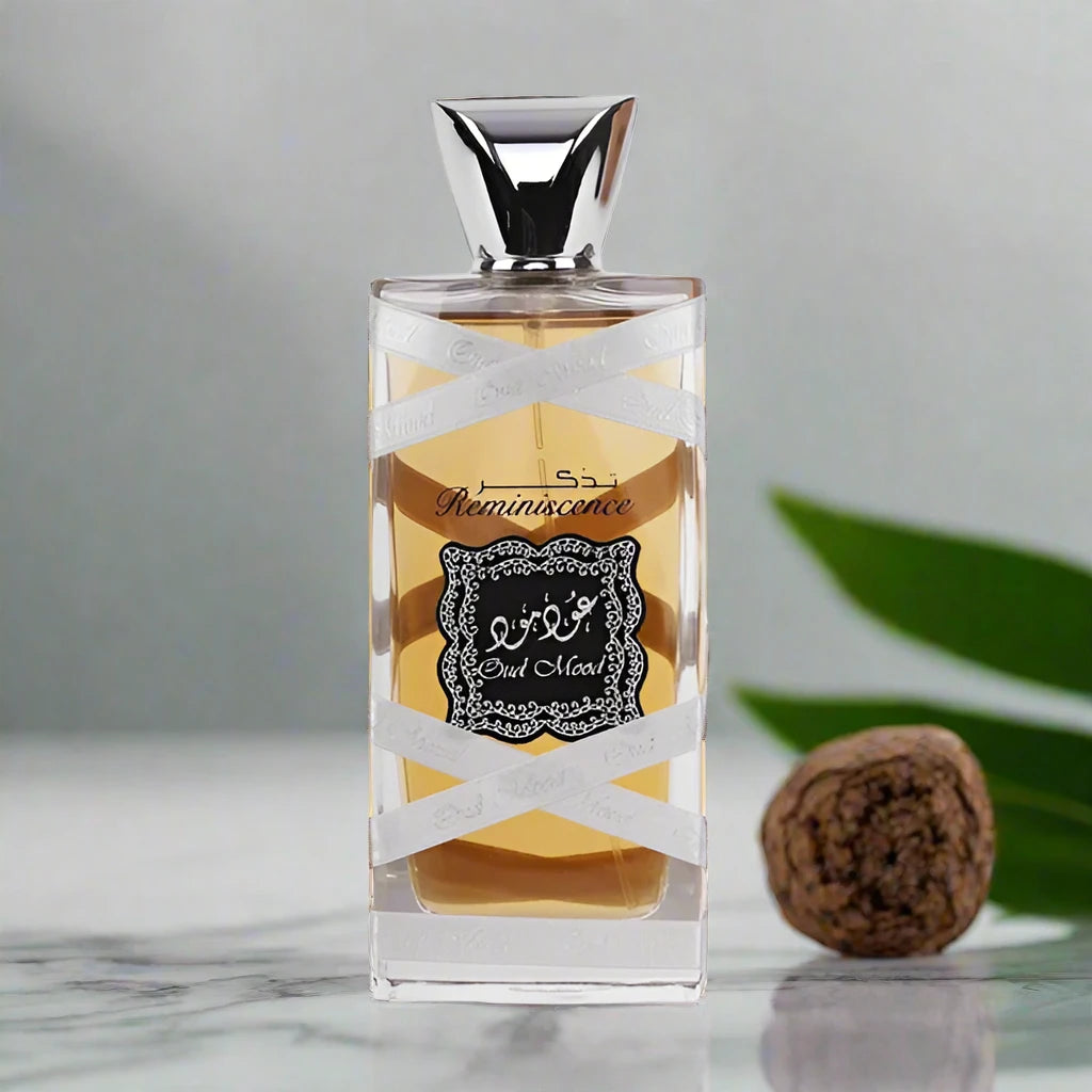 Oud Mood Reminiscence Silver Perfume 100ml EDP by Lattafa, a warm and spicy fragrance for unisex.